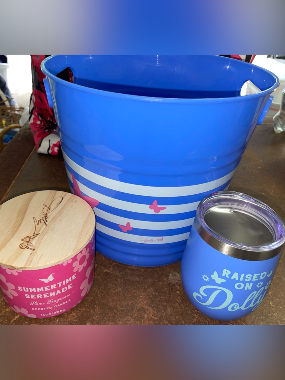 Blue Dolly Parton Striped Bucket with Pink Butterfly Accents, candle & cup
